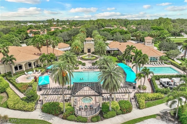 2434 Butterfly Palm Dr, Naples, FL 34119 - drone / aerial view of a pool area