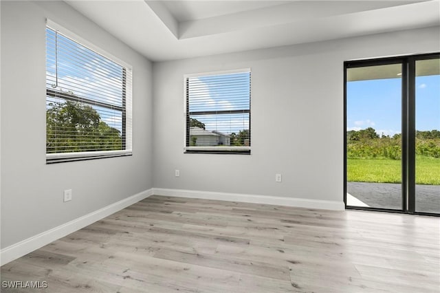 3006 72nd St W, Lehigh Acres, FL 33971 - unfurnished room with baseboards and wood finished floors