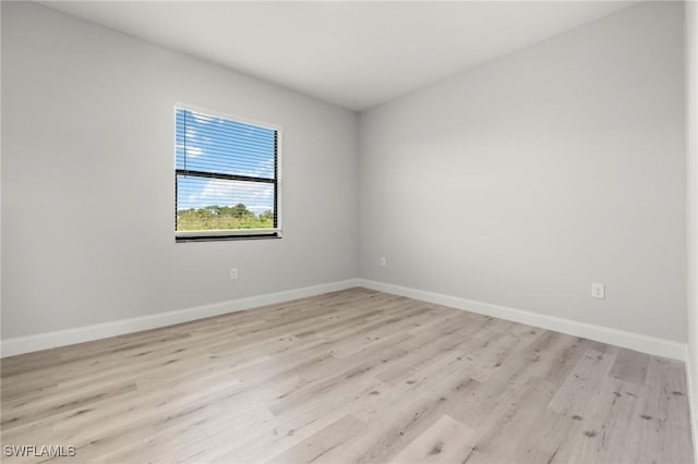 3006 72nd St W, Lehigh Acres, FL 33971 - empty room with light wood finished floors