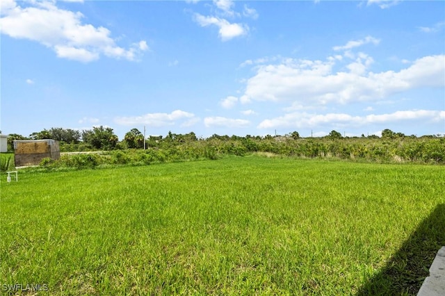 3006 72nd St W, Lehigh Acres, FL 33971 - view of yard with a rural view