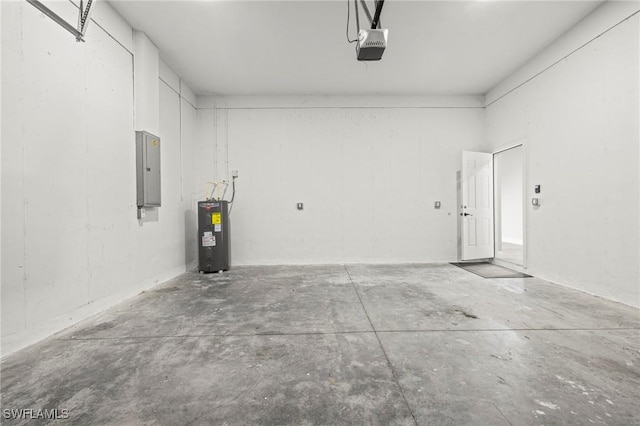 3006 72nd St W, Lehigh Acres, FL 33971 - garage with water heater, electric panel, and a garage door opener