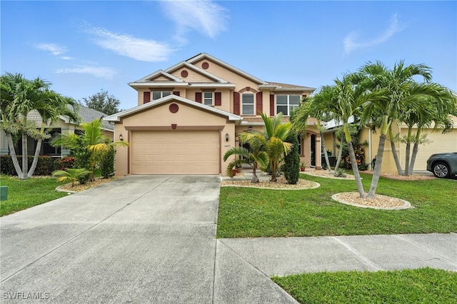 10043 Winding River Rd, Punta Gorda, FL 33950 - view of front of property featuring stucco siding, driveway, a garage, and a front lawn