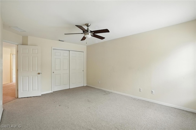 10043 Winding River Rd, Punta Gorda, FL 33950 - unfurnished bedroom with carpet floors, a closet, and a ceiling fan