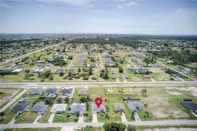 2116 NW 24th Ave, Cape Coral, FL 33993 - aerial view of property and surrounding area with nearby suburban area