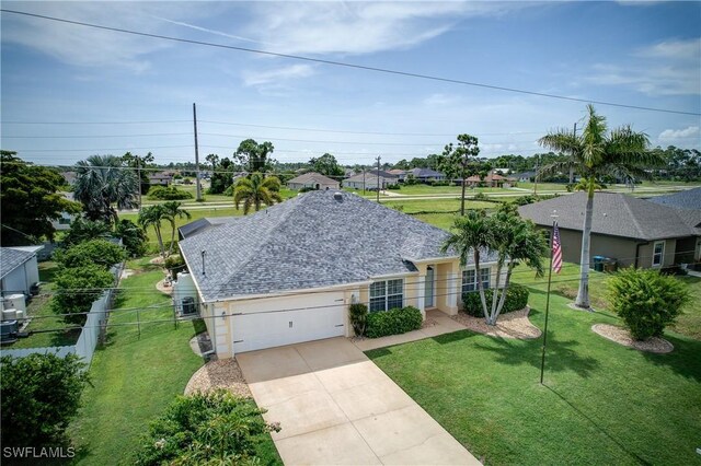 2116 NW 24th Ave, Cape Coral, FL 33993 - ranch-style home featuring driveway, an attached garage, a shingled roof, and a residential view
