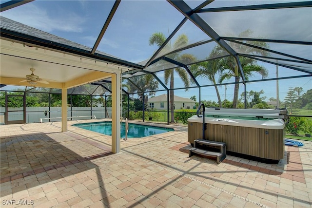 2116 NW 24th Ave, Cape Coral, FL 33993 - view of swimming pool with a hot tub, a patio, ceiling fan, and glass enclosure