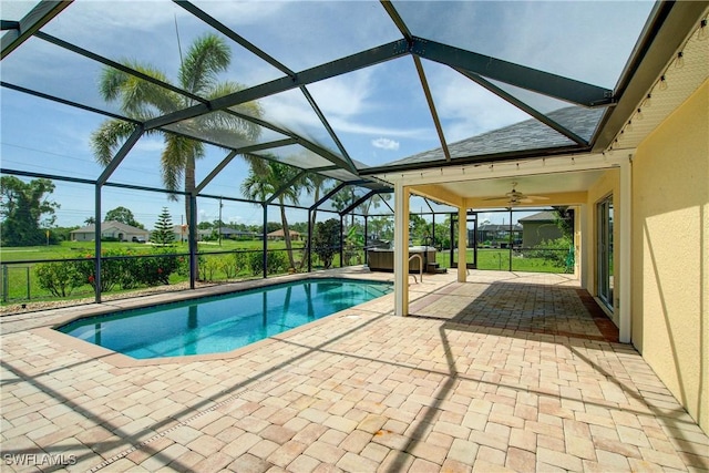 2116 NW 24th Ave, Cape Coral, FL 33993 - swimming pool featuring a hot tub, a patio, and glass enclosure