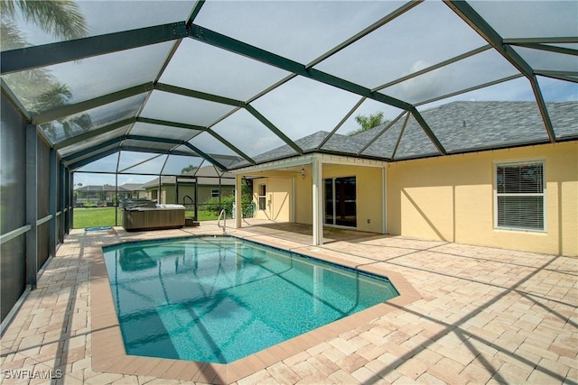 2116 NW 24th Ave, Cape Coral, FL 33993 - outdoor pool with a hot tub, a patio, and glass enclosure