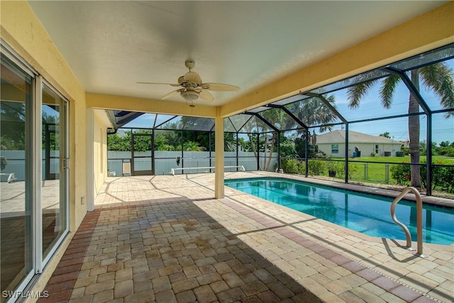 2116 NW 24th Ave, Cape Coral, FL 33993 - view of swimming pool featuring a patio area, a ceiling fan, and a lanai