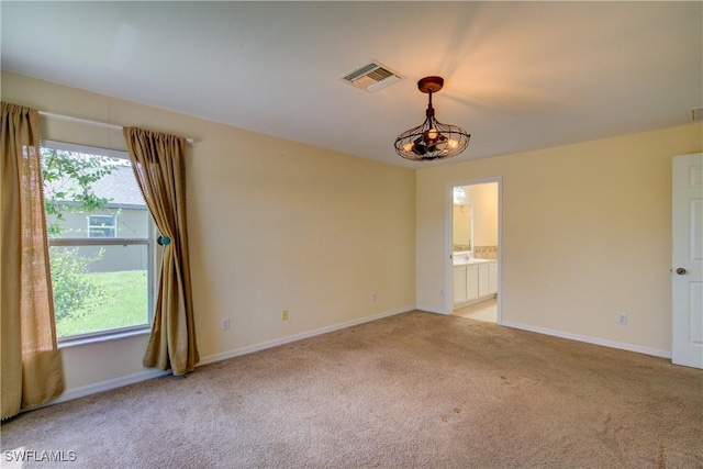 2116 NW 24th Ave, Cape Coral, FL 33993 - empty room with light colored carpet and baseboards