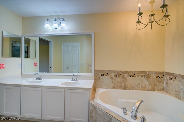 2116 NW 24th Ave, Cape Coral, FL 33993 - full bath featuring a bath, double vanity, and a chandelier