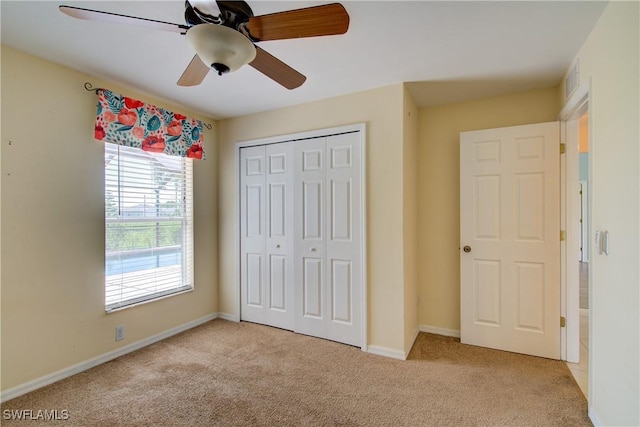 2116 NW 24th Ave, Cape Coral, FL 33993 - unfurnished bedroom with carpet flooring, a closet, and ceiling fan
