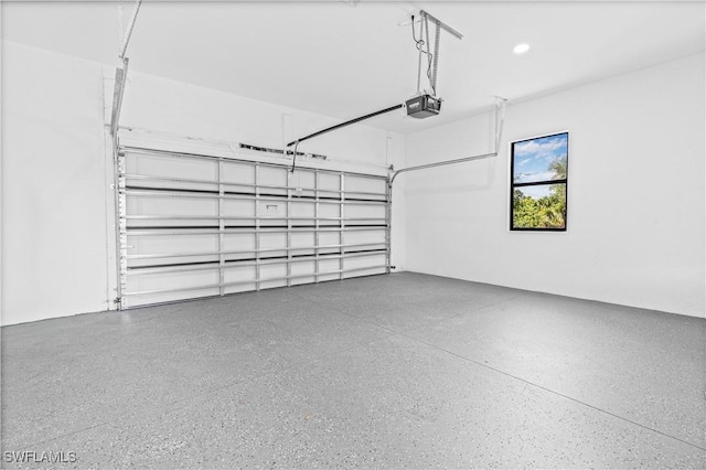 3200 44th St W, Lehigh Acres, FL 33971 - garage featuring a garage door opener