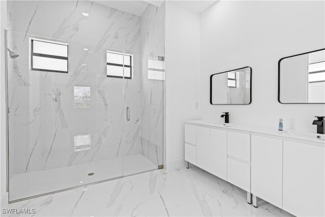 3200 44th St W, Lehigh Acres, FL 33971 - bathroom with marble look tile flooring, a marble finish shower, and double vanity