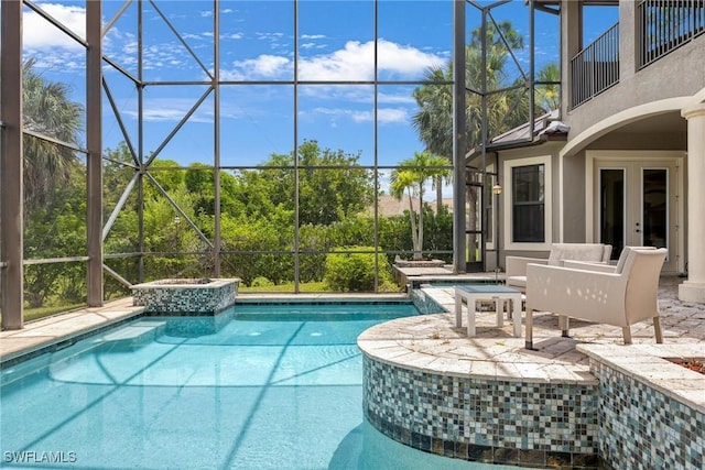 3917 La Vida Way, Cape Coral, FL 33993 - view of swimming pool with a lanai, a pool with connected hot tub, and a patio area