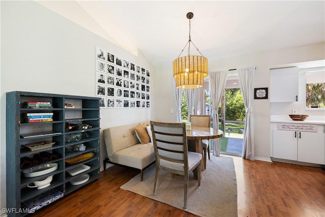 3715 41st Ave NE, Naples, FL 34120 - dining room with wood finished floors, vaulted ceiling, and a chandelier