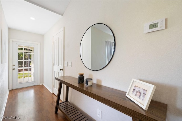 3715 41st Ave NE, Naples, FL 34120 - foyer featuring wood finished floors and baseboards