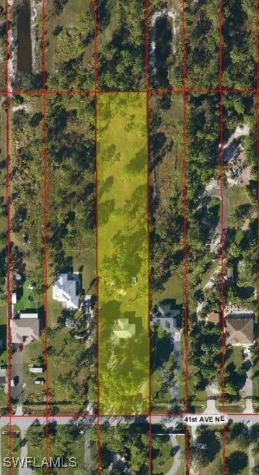 3715 41st Ave NE, Naples, FL 34120 - aerial map of property and surrounding area with property parcel outlined