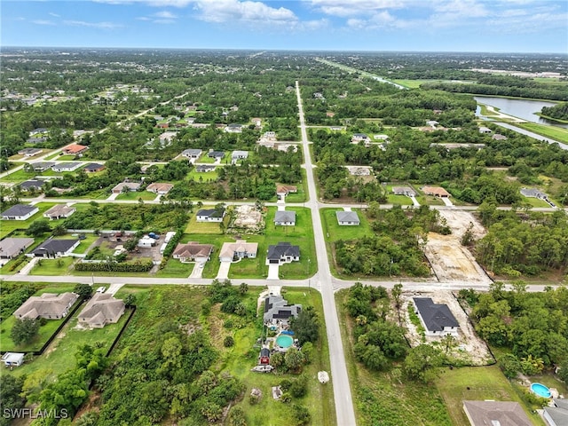 3219 43rd St W, Lehigh Acres, FL 33971 - aerial overview of property's location featuring a large body of water
