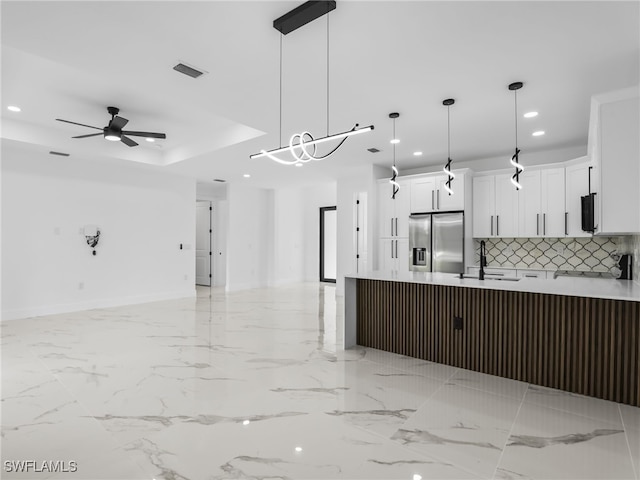 3219 43rd St W, Lehigh Acres, FL 33971 - kitchen featuring stainless steel fridge with ice dispenser, open floor plan, backsplash, recessed lighting, and a ceiling fan