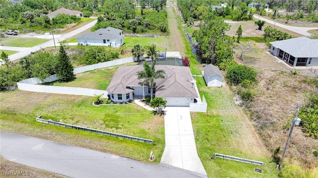 823 Portland St E, Lehigh Acres, FL 33974 - aerial perspective of suburban area