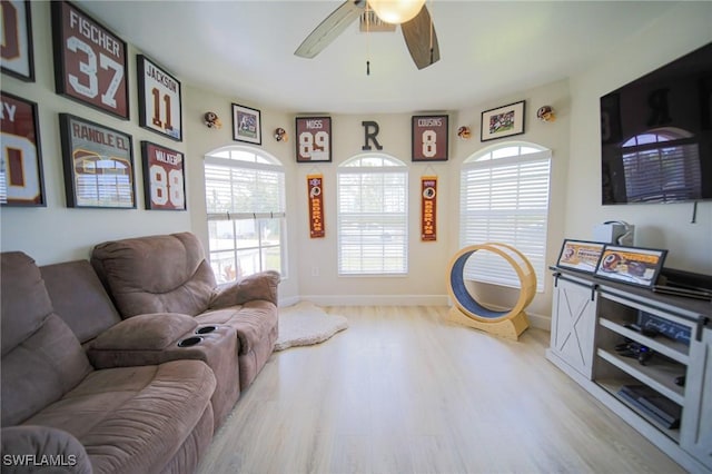 823 Portland St E, Lehigh Acres, FL 33974 - living area featuring wood finished floors and ceiling fan