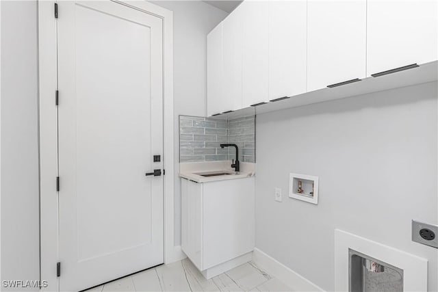 3306 40th St W, Lehigh Acres, FL 33971 - laundry room featuring hookup for an electric dryer, cabinet space, washer hookup, and wet bar
