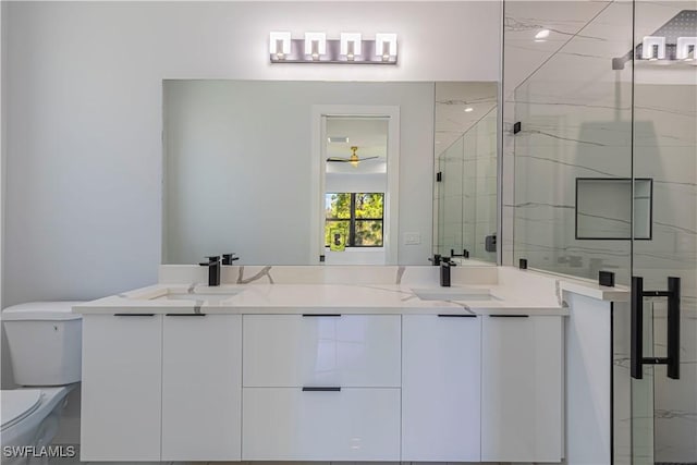 3306 40th St W, Lehigh Acres, FL 33971 - bathroom featuring double vanity and a marble finish shower