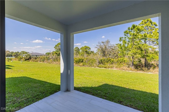 3306 40th St W, Lehigh Acres, FL 33971 - view of green lawn featuring a patio