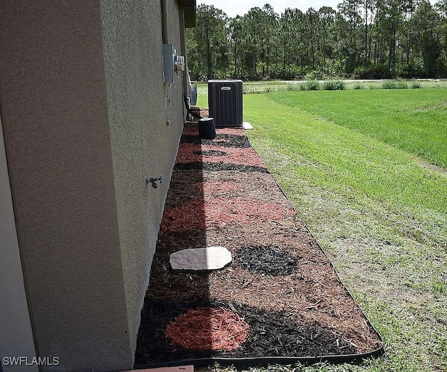 845 Lochman Dr, Fort Myers, FL 33913 - view of grassy yard with a forest view