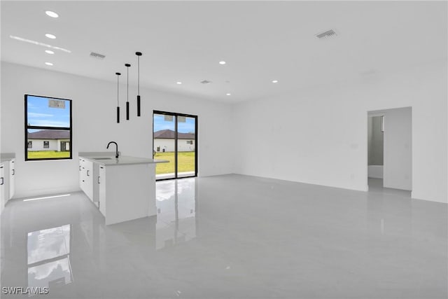 645 Hutton St, Lehigh Acres, FL 33974 - unfurnished living room with recessed lighting