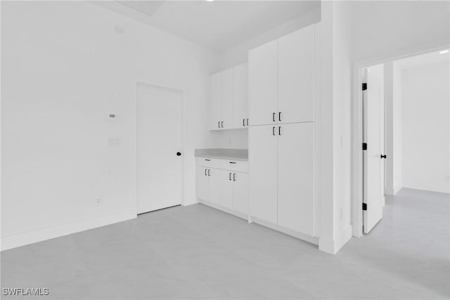 645 Hutton St, Lehigh Acres, FL 33974 - bonus room featuring finished concrete floors