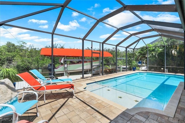 4911 Esplanade St, Bonita Springs, FL 34134 - outdoor pool with a patio and glass enclosure