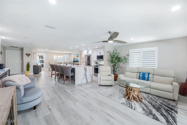 4911 Esplanade St, Bonita Springs, FL 34134 - living room with recessed lighting and a ceiling fan