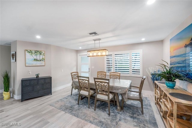 4911 Esplanade St, Bonita Springs, FL 34134 - dining room with recessed lighting and wood finished floors