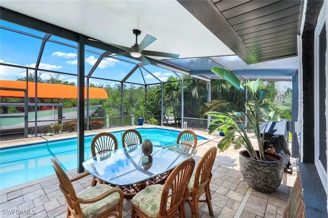 4911 Esplanade St, Bonita Springs, FL 34134 - swimming pool with a patio, glass enclosure, and outdoor dining area