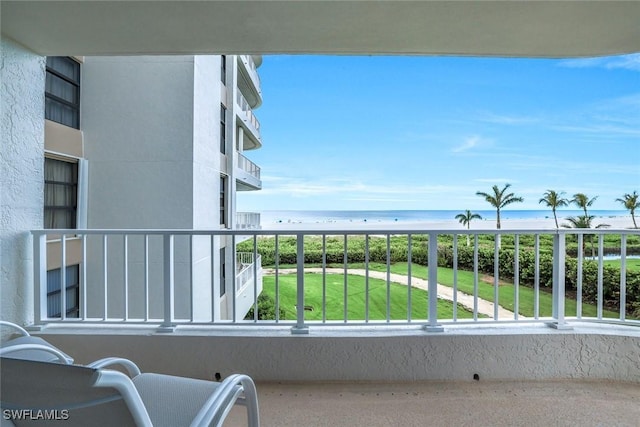 300 S Collier Blvd Unit 303, Marco Island, FL 34145 - balcony featuring view of water and beach