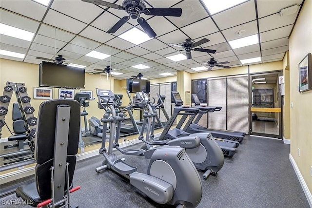 300 S Collier Blvd Unit 303, Marco Island, FL 34145 - exercise room featuring ceiling fan and a paneled ceiling