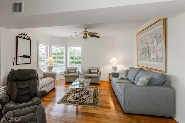 991 N Barfield Dr Unit 101, Marco Island, FL 34145 - living area with ceiling fan and wood finished floors