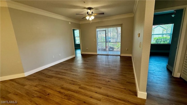 11530 Villa Grand Unit 1101, Fort Myers, FL 33913 - unfurnished room featuring crown molding, healthy amount of natural light, ceiling fan, and dark wood-style flooring