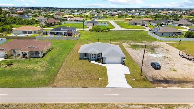 1702 Nelson Rd N, Cape Coral, FL 33993 - aerial perspective of suburban area