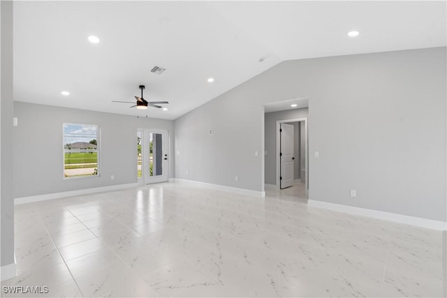 1702 Nelson Rd N, Cape Coral, FL 33993 - empty room with recessed lighting, a ceiling fan, light marble finish floors, and vaulted ceiling