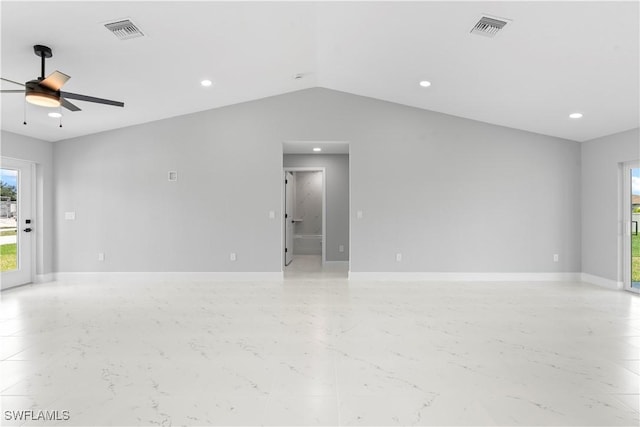 1702 Nelson Rd N, Cape Coral, FL 33993 - empty room with a ceiling fan, healthy amount of natural light, recessed lighting, and vaulted ceiling
