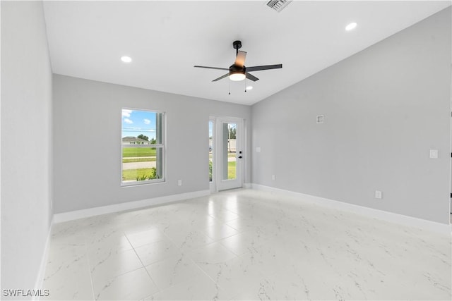 1710 Nelson Rd N, Cape Coral, FL 33993 - spare room with a ceiling fan, light marble finish flooring, and recessed lighting