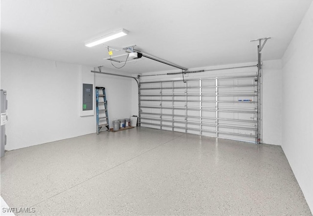 1710 Nelson Rd N, Cape Coral, FL 33993 - garage featuring electric panel and a garage door opener