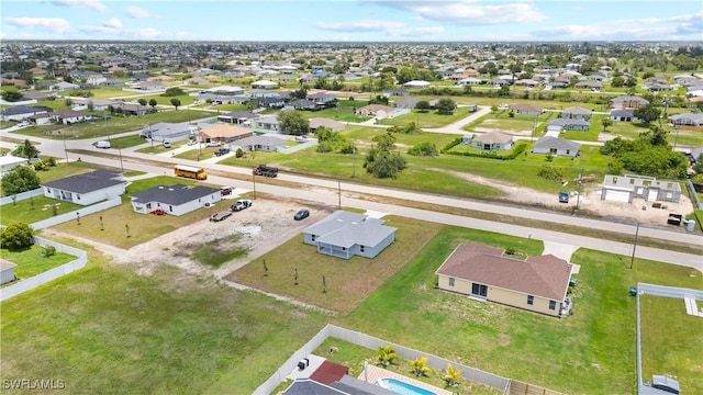 1710 Nelson Rd N, Cape Coral, FL 33993 - aerial perspective of suburban area