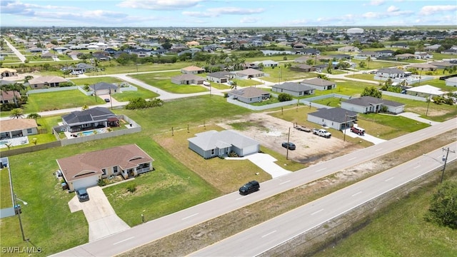 1710 Nelson Rd N, Cape Coral, FL 33993 - aerial perspective of suburban area
