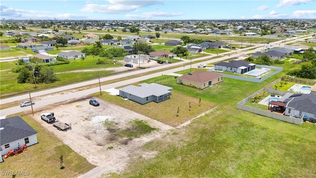 1710 Nelson Rd N, Cape Coral, FL 33993 - aerial perspective of suburban area