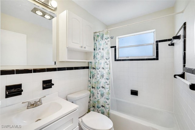 527 Goodland Drive W, Goodland, FL 34140 - full bath featuring tile walls, shower / bath combo with shower curtain, and vanity