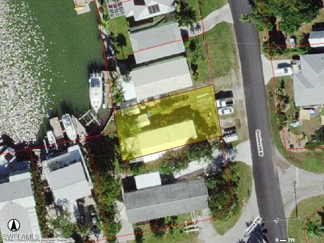 527 Goodland Drive W, Goodland, FL 34140 - aerial perspective of suburban area featuring property parcel outlined